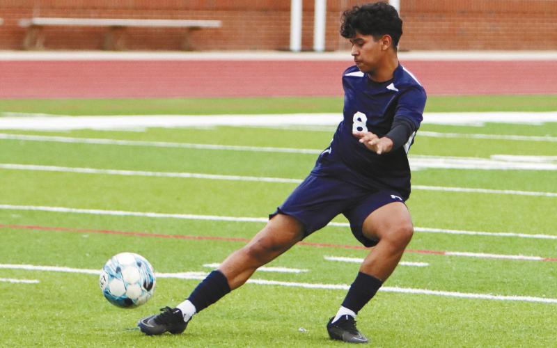 Putnam County’s Angel Sanchez attempts to pass the ball to a teammate during a region match last season. LANCE MCCURLEY/Staff