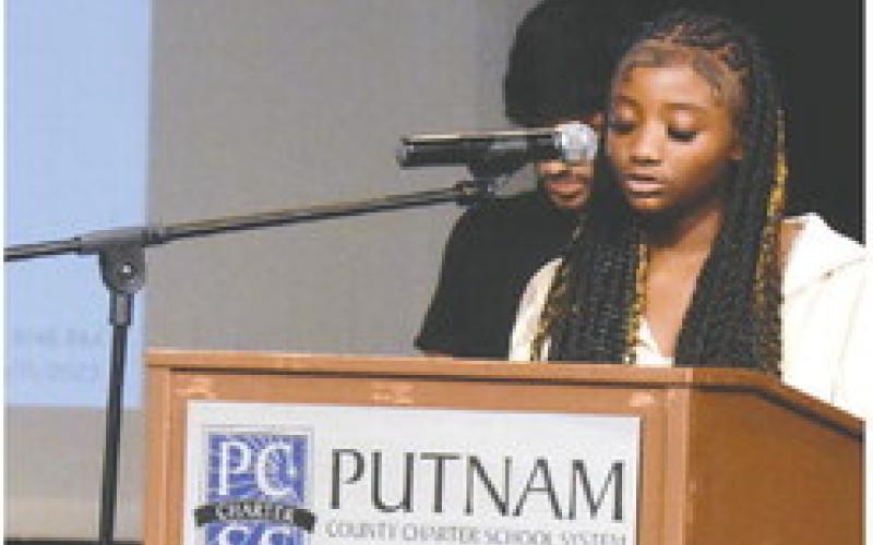 One of the students who attended the placebased experiential learning trip to Albany State University presented their hip-hop rap about civil rights and not repeating history. BAILEY McCULLY/Staff