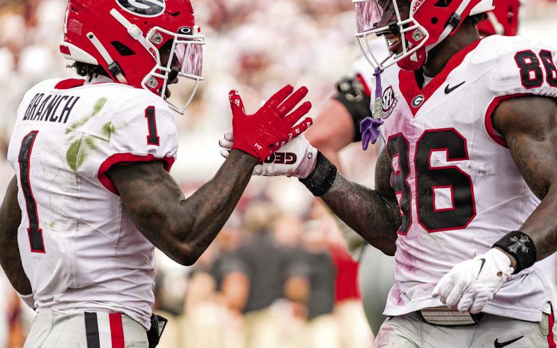 Georgia wide receiver Zachariah Branch (1) celebrates with teammate Dillon Bell (86) after he scored a touchdown in the second quarter against Mississippi State on Saturday, Nov. 8. Courtesy of UGA Athletics