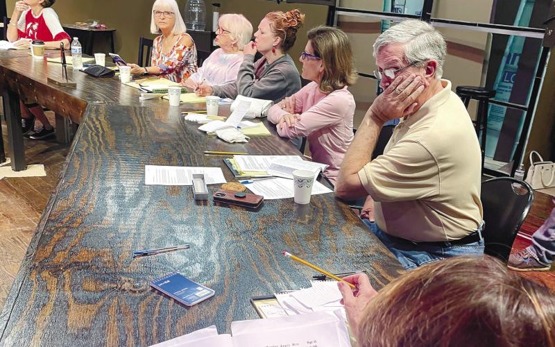 Actors ponder their lines as they rehearse together and prepare for the Nov. 9 opening of 12 Angry Jurors at The Plaza Arts Center. CONTRIBUTED