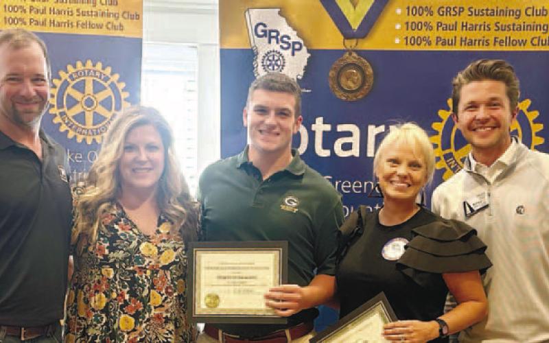 L-R: Mac Rainey, Libby Rainey, Aidan Rainey, Beth Moss, and Rotarian Dr. Tyler Franks. CONTRIBUTED