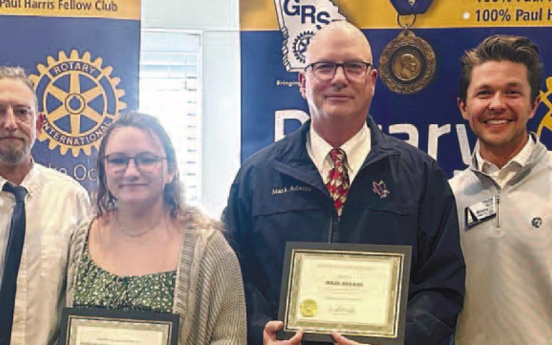 L-R: Steve Pressley, Emily Pressley, Mark Adams, and Rotarian Dr. Tyler Franks. CONTRIBUTED