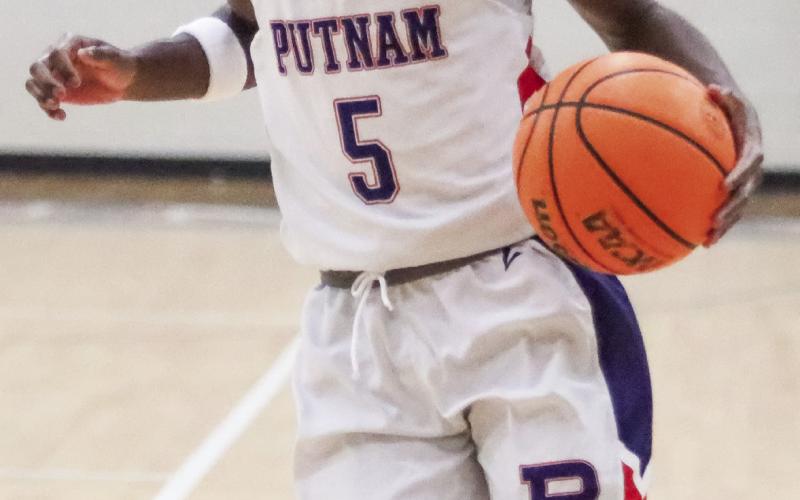Putnam County’s Jaylin Harper has been a reliable guard player through four games. Last week, he scored 19 points in a win over Monroe (Albany). LANCE McCURLEY/Staff