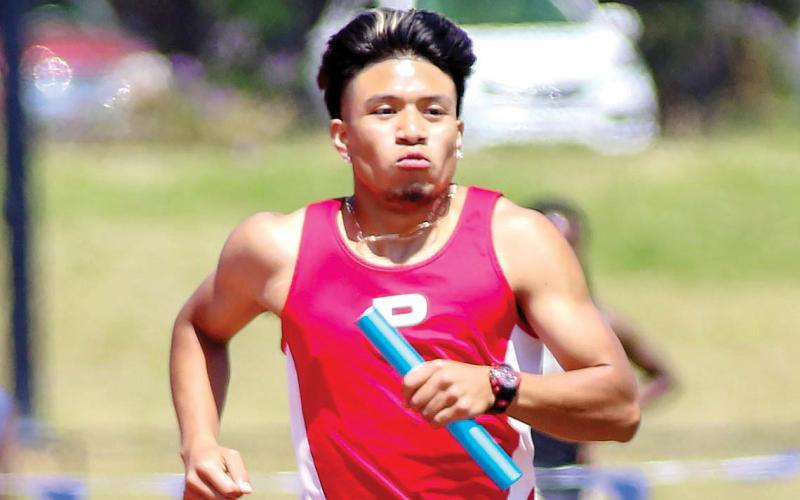 Putnam County distance runner Christian Hernandez competes in the 4x800 meter relay at the Region 4-AA meet in Eatonton. TREY NORRIS/Staff