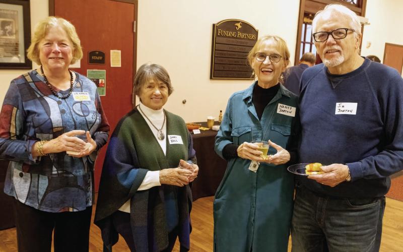 Liz Kippels and Shari Ball meet up with Nancy and Jim Barton at the artist reception last Wednesday evening. LEIGH LOFGREN/Staff