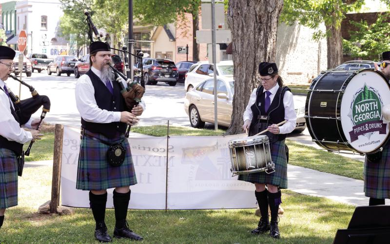 Bagpipers and drummers play outside as attendees arrive to First Presbyterian Church in Greensboro for Scottish Heritage Day. LEIGH LOFGREN/Staff