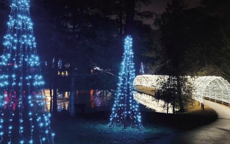 As visitors approach the entrance of Lockerly in Lights, they are greeted by the distant glow of the tunnel of lights. BAILEY BALLARD/Staff