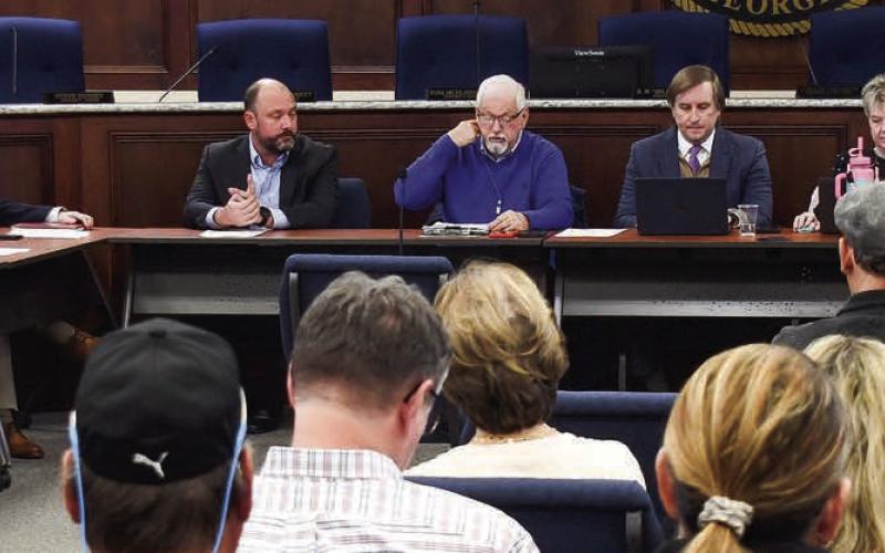 With PDA board members lined up on the left and county commissioners on the right, the seating arrangement mirrored the adversarial relationship that seems to have developed lately. IAN TOCHER/Staff