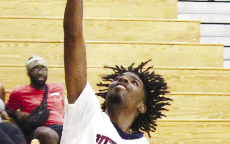 Michael Little (class of 2021) goes up for an easy layup. TREY NORRIS/Staff