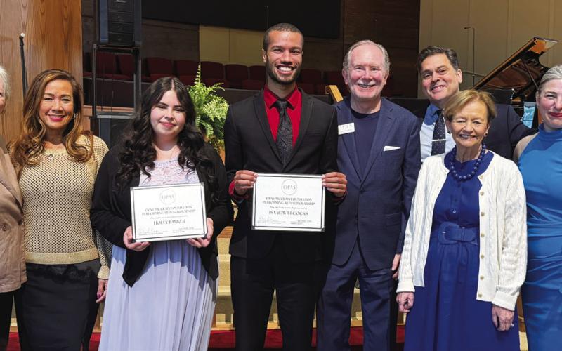 OPAS board members presented college sophomore Holly Parker and master’s candidate Isaac Willocks with individual scholarships from Mercer University’s McDuffie Center for Strings. CONTRIBUTED