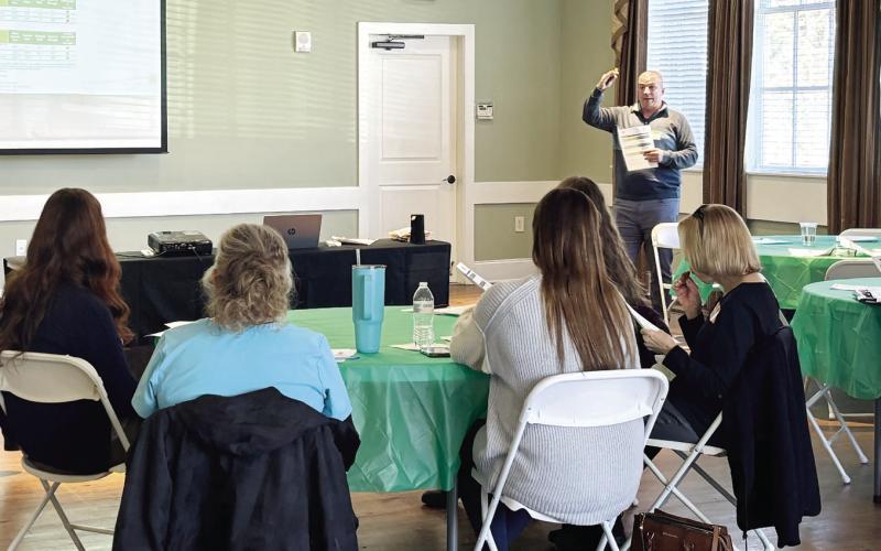 Kirk O’Brien, evaluation consultant with Georgia Family Connection Partnership, discusses the main three indicators that concern the Collaborative’s mission to aid families and children in Putnam County. EMME CLAUSE/Staff
