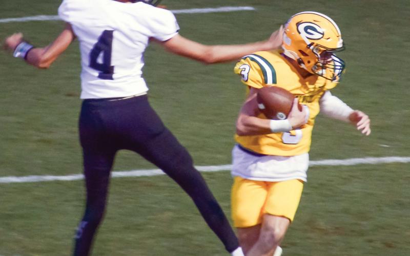 Gatewood senior Jackson Hewatt made a great catch, then spun his way into the end zone for the Gators' first touchdown against Southland. (IAN TOCHER/Staff)