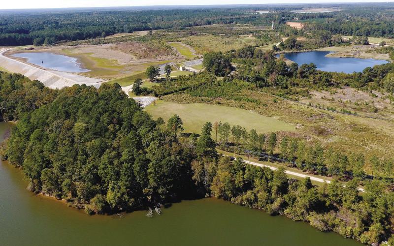 2018 aerial view of two ponds on the Plant Branch site north of Milledgeville. Lake Sinclair is in the foreground. MARK ENGEL/File photo