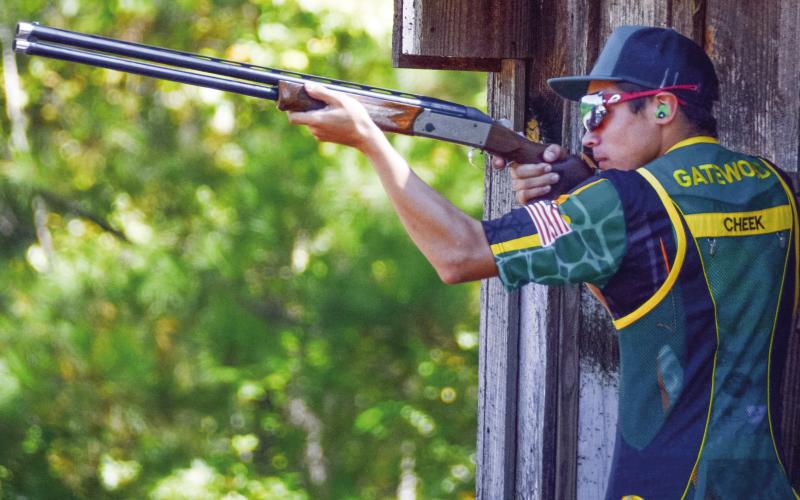 Gatewood’s Colton Cheek fires during the skeet portion of the event on Saturday at Old Hudson Plantation in Sparta. CONTRIBUTED