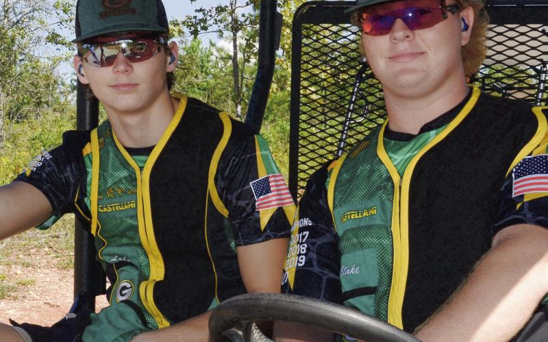Gators Lake Ferman (left) and Blake Daniel head out from one of the sporting clay stations at Old Hudson Plantation. Daniel, the center on Gatewood’s football team, also was among five Gators with a perfect 50 score in skeet. CONTRIBUTED