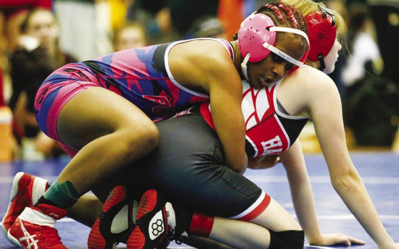 Bryson Pearson gets in position to face an opponent during a match at the traditionals sectionals duals Feb. 4.