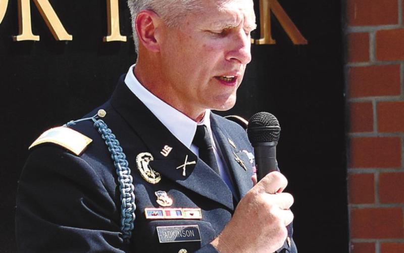 Lt. Col. Adkinson, instructor of the Putnam County High School JROTC program, speaks at the Memorial Day ceremony. T. MICHAEL STONE/ S t a ff