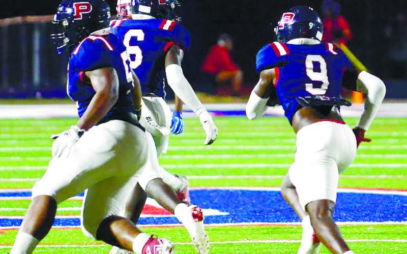 Putnam County senior Kaleb Crawford (9) racked up 103 yards on three receptions last Friday against Westside-Augusta and scored two touchdowns in the War Eagles’ 28-15 win over the visiting Patriots. IAN TOCHER/Staff