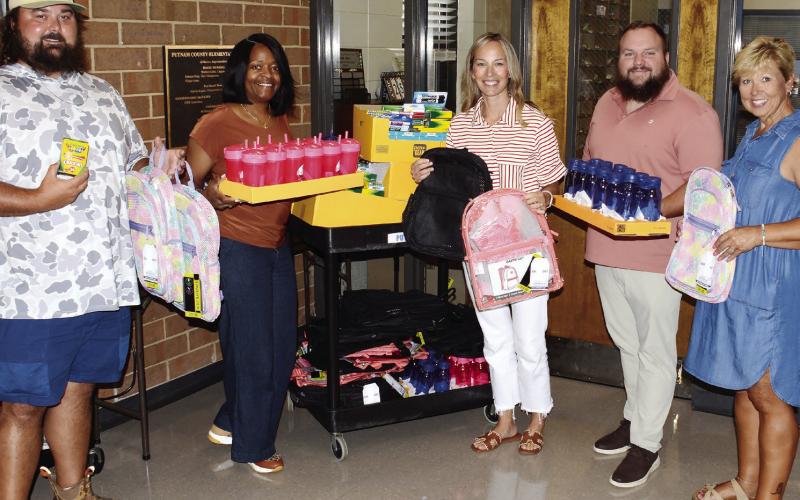 L-R: At Putnam County Primary School (l-r) Leadership Putnam’s AJ Nugent, school principal Dr. Fanicia Rogers, Assistant Principal Holly Hardie, class president Justin Hadden, and LP’s Diane Carter display the donated supplies. CONTRIBUTED