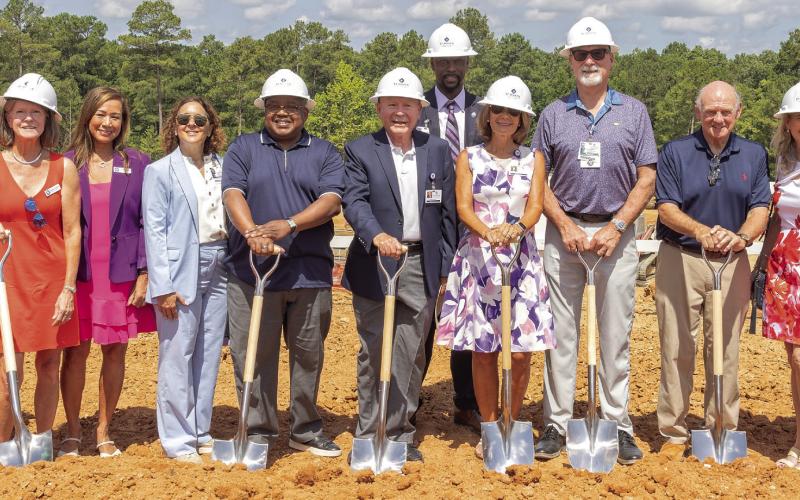 St. Mary’s and community leaders pose for a photo to celebrate breaking ground for the St. Mary’s Good Samaritan Pavilion. LEIGH LOFGREN/Staff
