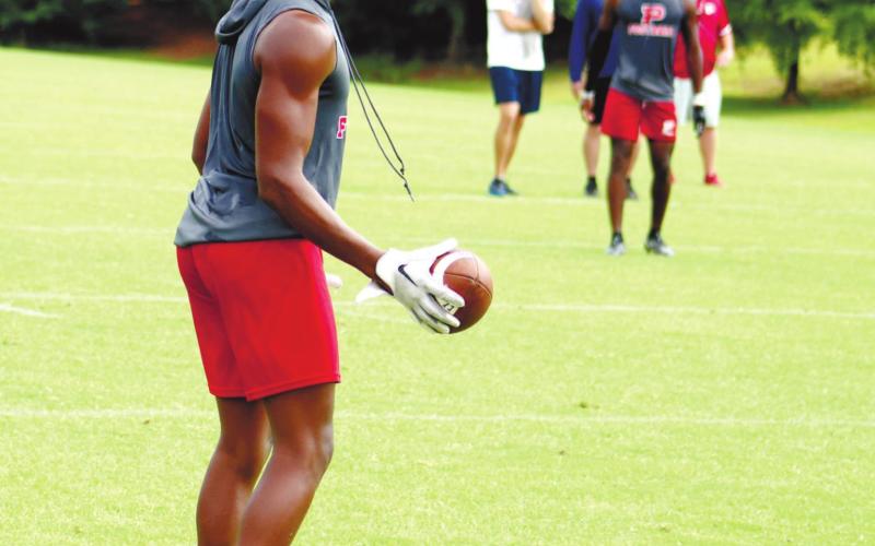 D.J. Bland comes up with the ball after a completion against Jasper County. ARELLA CASH/Staff