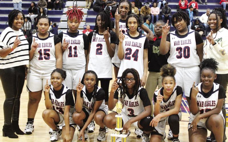 Head coach Sha’Kedra Ellison has her Putnam County Middle School girls at the top of their game, as they combined recently to win the team’s third-consecutive conference championship. KIM CASH/Staff