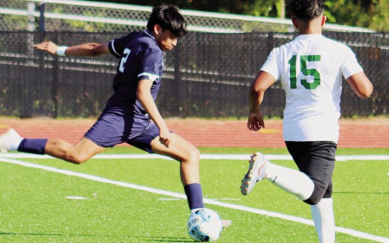 Putnam County’s Bryan Canales (2) takes a shot on goal during a match last season. ARELLA CASH/File photo
