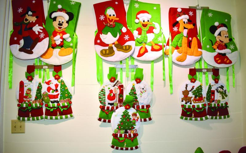 Carmenza Moreno contributed a collection of stitched artwork featuring Mickey Mouse and gang in winter attire. BAILEY BALLARD/Staff