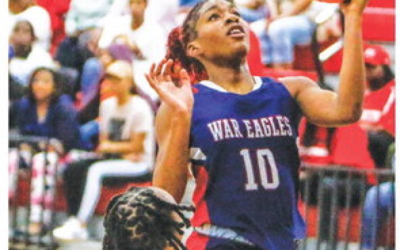 Putnam County’s Journey Waller (10) goes up for a layup in a win over Social Circle on Feb. 4. The Lady War Eagles will rely on the sophomore and leading scorer as they prepare for the Class A Division I playoffs, which begins next week. LANCE MCCURLEY/Staff