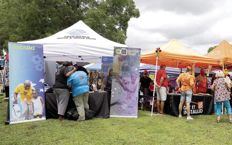 Some of the many vendors at the festival Saturday. LEIGH LOFGREN/Staff