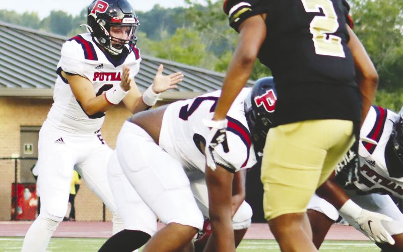 War Eagles' quarterback Branan Griffin (8) gets set to take a snap in the first half of last year's scrimmage against Greene County.  BRENDAN KOERNER/Staff