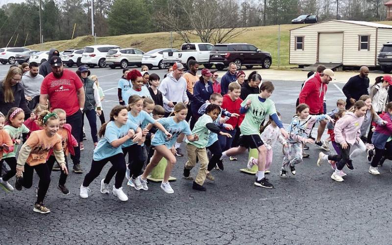 Chairperson Linda Elkins said the kids’ Fun Run is always one of her favorite moments of the annual Ferst Readers’ Seuss on the Loose event at Putnam County Primary School. CONTRIBUTED