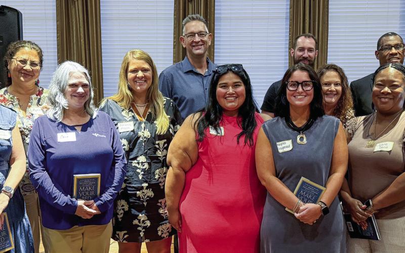 L-R: Eatonton-Putnam Chamber of Commerce CEO Robbie King, Brandy Parham, Maria Maddox, Carrie Pye, Adrianne Moore, Brandon Groome, Michelle Ruiz, William Biggers, Megan Fitzgerald, Erica Haley, Juana Dunn Davis, William Gilbert, Mallory Fitzgerald, and Denise Merrit. Not present: Franny Burton, Thomas Goss, Warren Linwood, and Kimberly Scott. IAN TOCHER/Staff