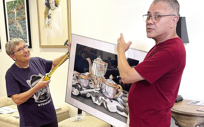 Artwork is prepared for display as part of the GWS Member Exhibition from Sept. 16 to Oct. 26 at Festival Hall in Greensboro. (CONTRIBUTED)
