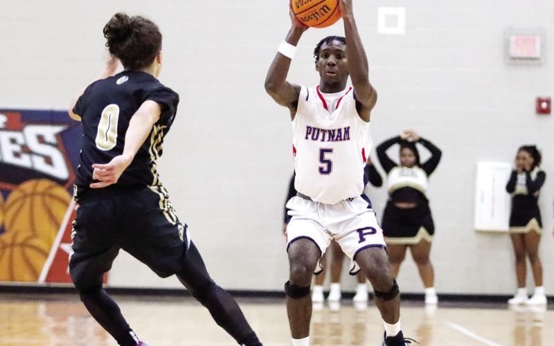 Junior Jaylin Harper (5) has played a key role in the War Eagles’ success this year. He scored 19 points in the loss to Veterans last week. LANCE MCCURLEY/Staff