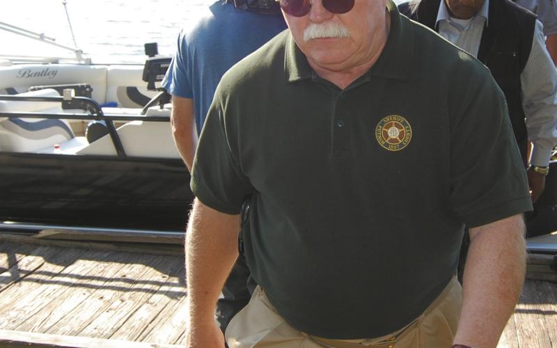 Sheriff Howard Sills exits a boat after recovering the body of Shirley Dermond from the waters of Lake Oconee. FILE PHOTO
