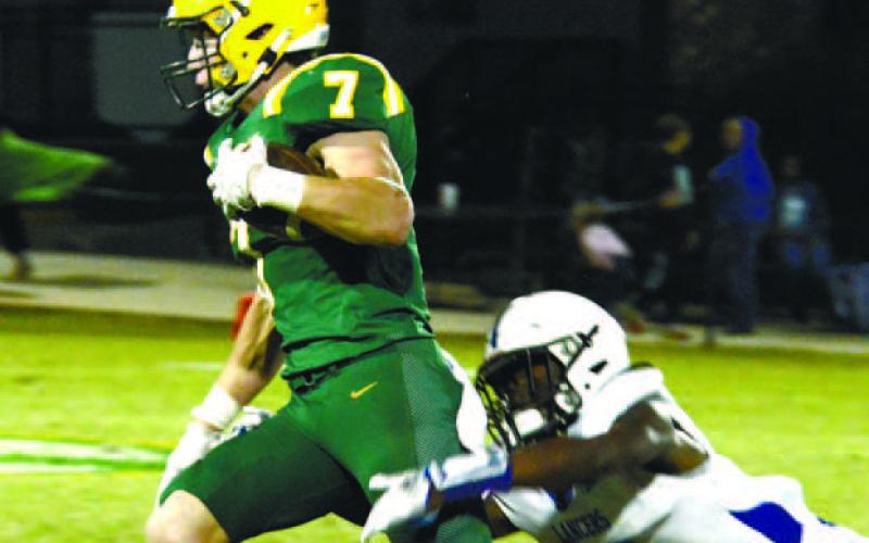 The strong play of Gatewood’s Evan Bennett (7) this season drew the attention of University of North Carolina recruiters, resulting in a full scholarship offer for the 6-foot-3, 205-pound junior. IAN TOCHER/Staff
