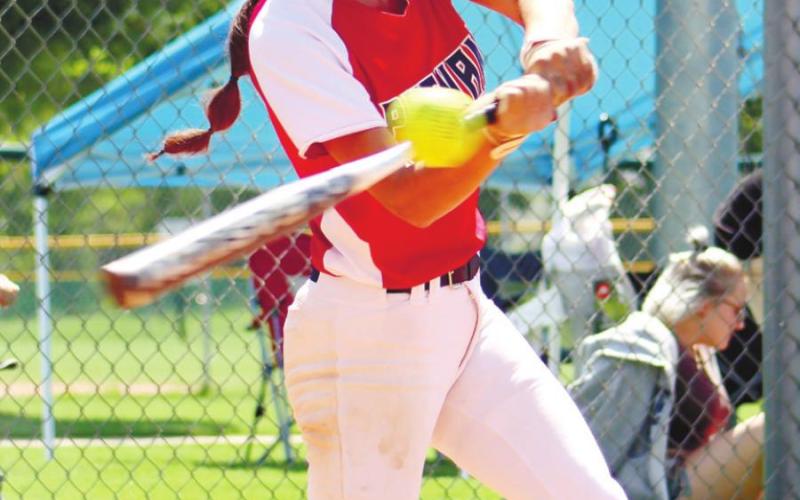 Senior Jeanna Mcderment with a double.