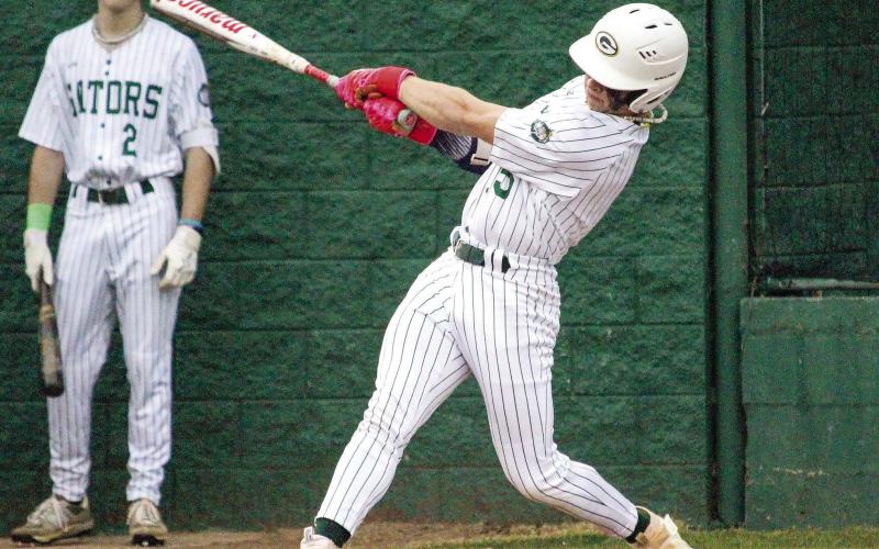 Gatewood junior Caleb Riser (right) has been doing a good job lately, both at the plate and running the bases. TREY NORRIS/Staff