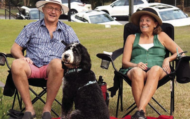 The Swingin’ Medallions entertained a large, enthusiastic crowd last Saturday night at The Plaza Arts Center in Eatonton. Dancing was the order of the day, though many music fans also chose to sit back and enjoy the show, including Reynolds residents Chuck and Janet Kohler (right) with their dog, Stella. Unfortunately, heavy rains later that night cut the concert a little short. PHOTOS BY IAN TOCHER/Staff