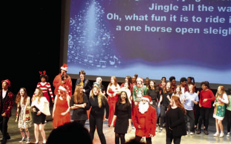 PCHS students sing a rousing version of “Jingle Bells.”