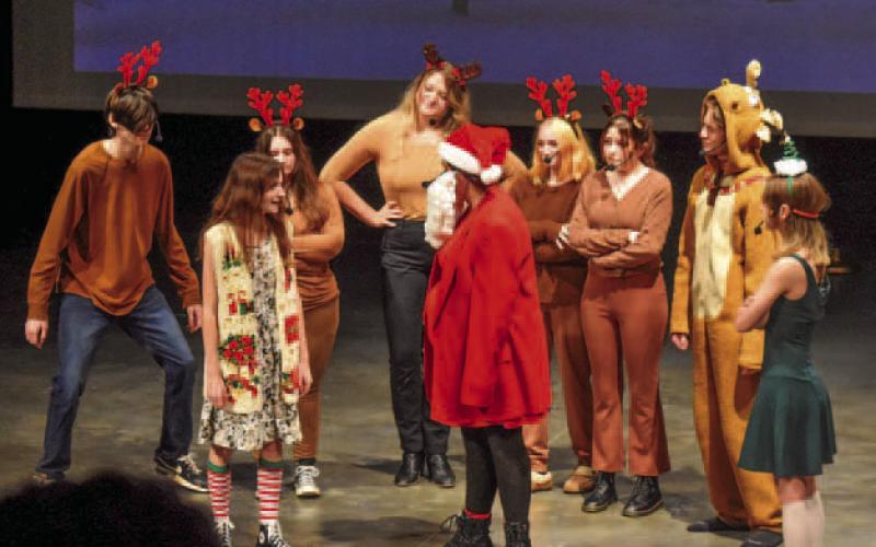 Drama students perform a skit named “Grandma Got Beat Up by a Reindeer.”