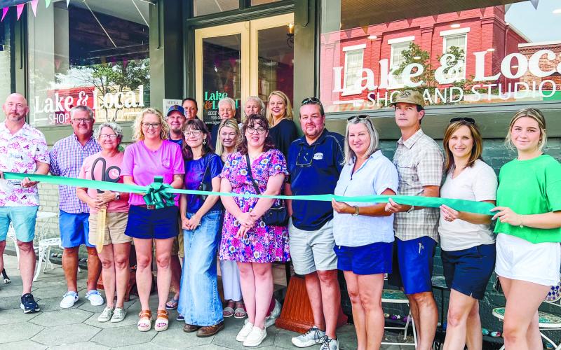 Lake &amp;amp; Local cut the ribbon to their new location alongside Chamber of Commerce members The Palms on Main and The Boat Shop. CONTRIBUTED