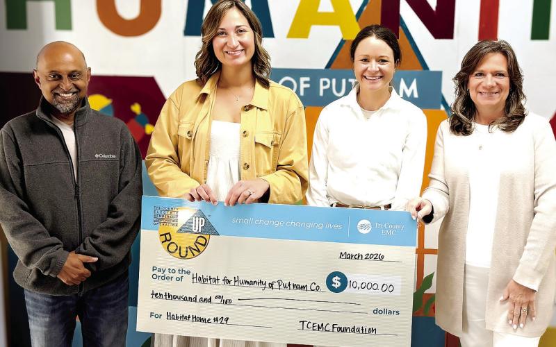 L-R: Habitat for Humanity of Putnam Executive Director Murali Thirumal, Tri-County EMC Communication Specialist Anna Smith, HFHP Marketing &amp;amp; Development Manager Katherine Mahlberg, and HFHP Board Chair Linda Moore at a check presentation last Thursday. CONTRIBUTED