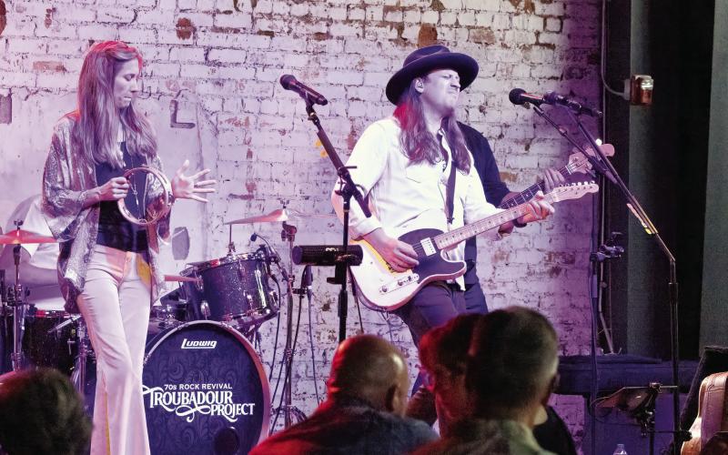 Troubadour Project vocalists Jessie Albright and Jim Stapley on stage Saturday. (LEIGH LOFGREN/Staff)