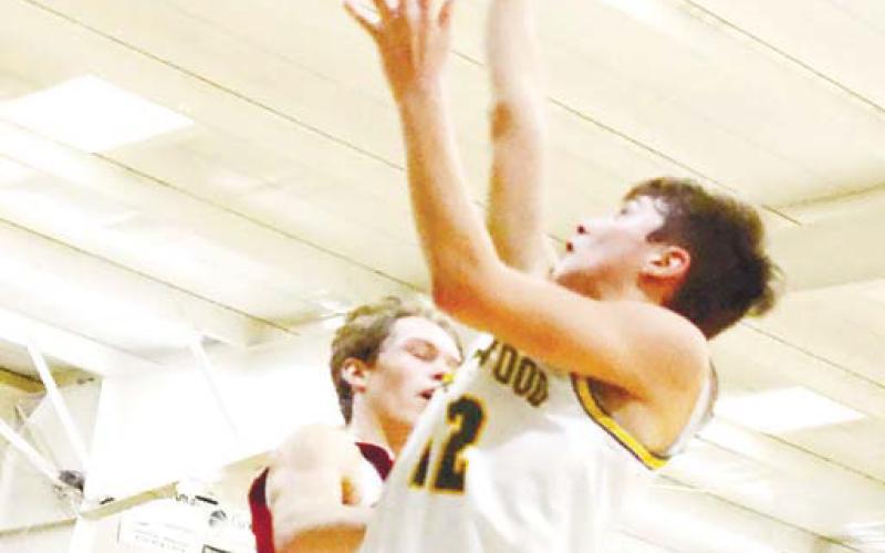 Freshman Matt Allen (12) already provides a consistently strong offensive threat for the Gatewood boys’ varsity team. IAN TOCHER/Staff