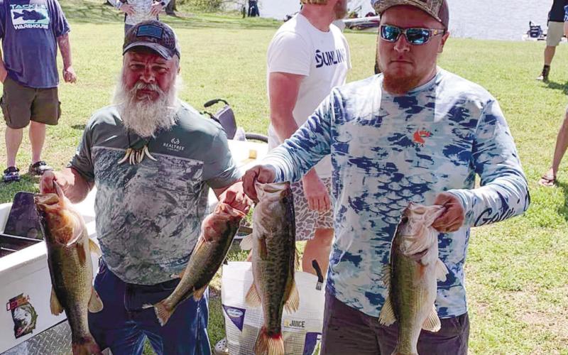 Jason Long and Kody Nixon with their winning haul of the day. CONTRIBUTED