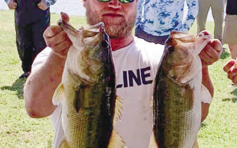 John Duvall proudly showing his two catches. CONTRIBUTED