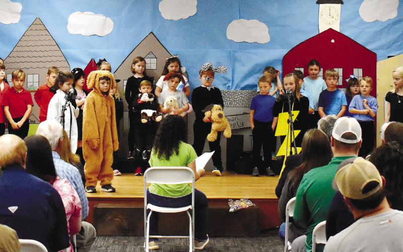 First-grade Gatewood students present their Weather Show to families and friends. LENA HENSLEY/Staff