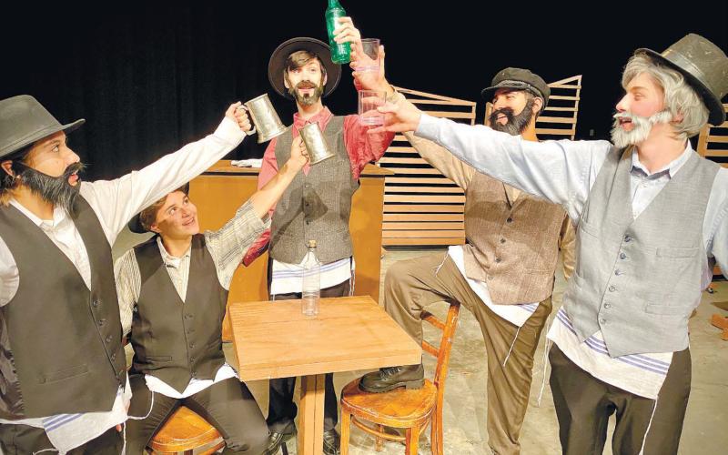 Villagers (from left, Daniela Carrasco-Portillo, Joelle Lukens, Ethan Poole, David Trice, and Ty Young) celebrate Lazar Wolf’s engagement to Tevye’s daughter, Tzeitel. CONTRIBUTED